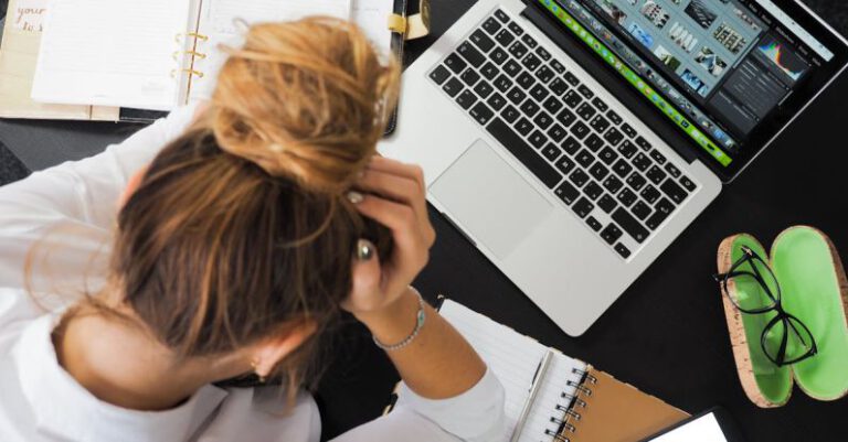 Work - Woman Sitting in Front of Macbook