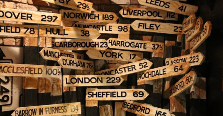 Signs - Brown Wooden Signage Hanging Beside Wall