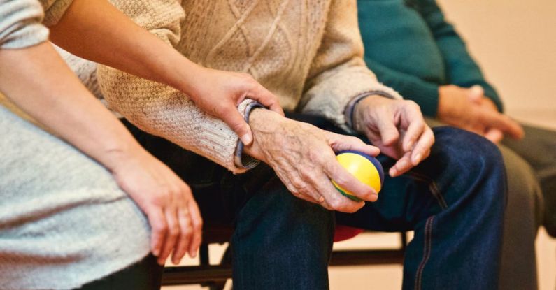 Support Group - Person Holding a Stress Ball